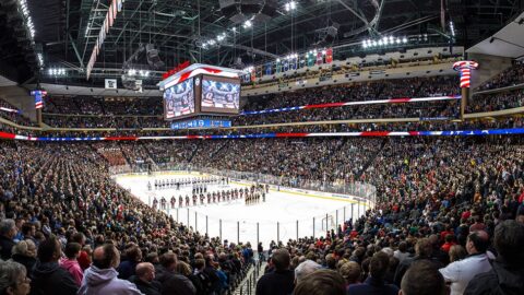 A hockey game in a full arena