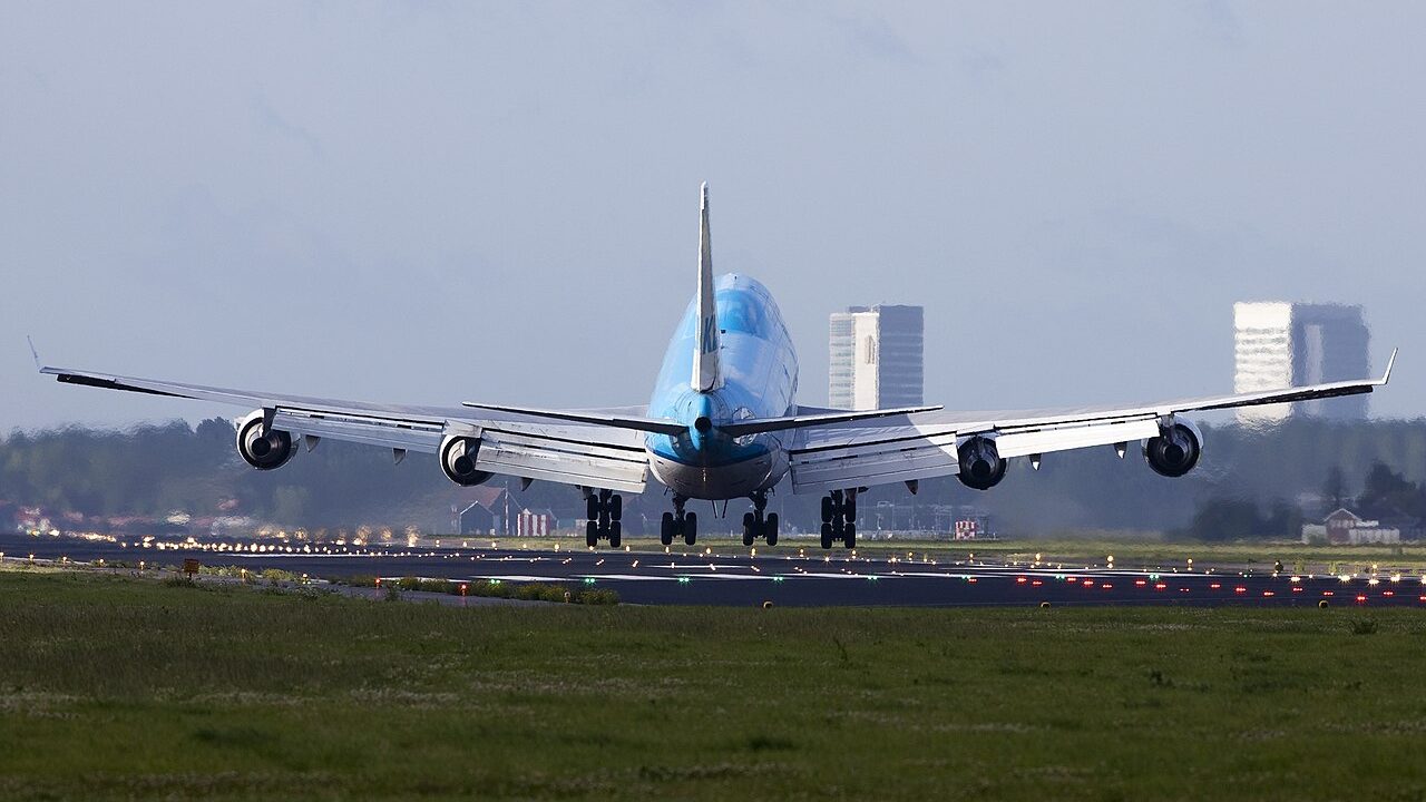 A passenger jet landing in a crosswind