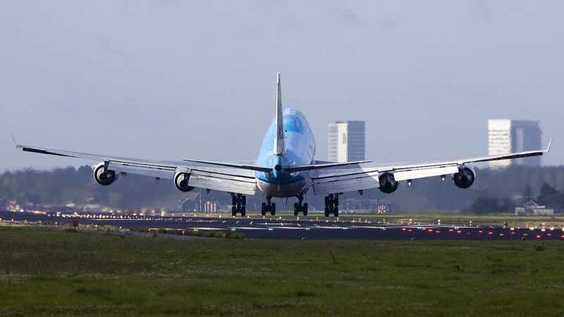 A passenger jet landing in a crosswind