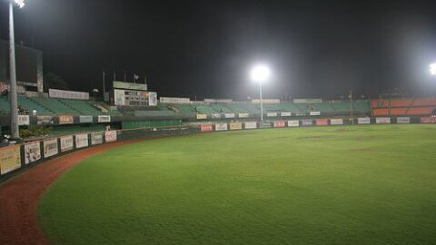 Night baseball stadium under lights