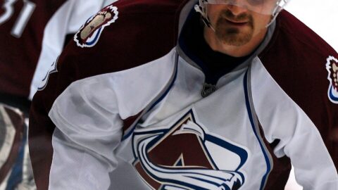 An NHL forward skating with the puck