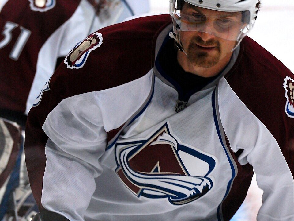 An NHL forward skating with the puck