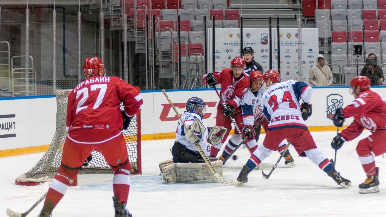 Players attacking the net during an NHL game