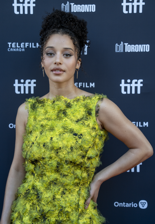 Chase Infiniti in a modest yellow textured dress at the Toronto International Film Festival