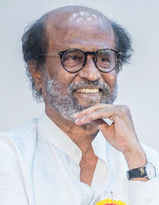 Rajinikanth smiling at a public event