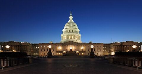 The United States Capitol illuminated at dusk in Washington